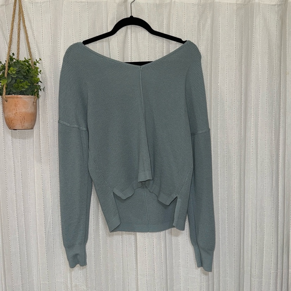 Light blue sweater